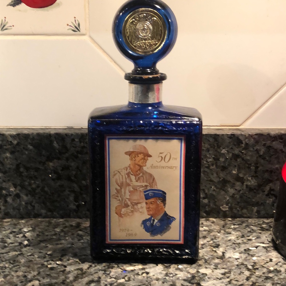 Vintage J.W. Dant wisely bottle